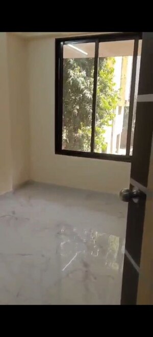 Bedroom in 1 BHK Apartment at Happy Home Sarvoday Marvel, Kalyan West – for Sale