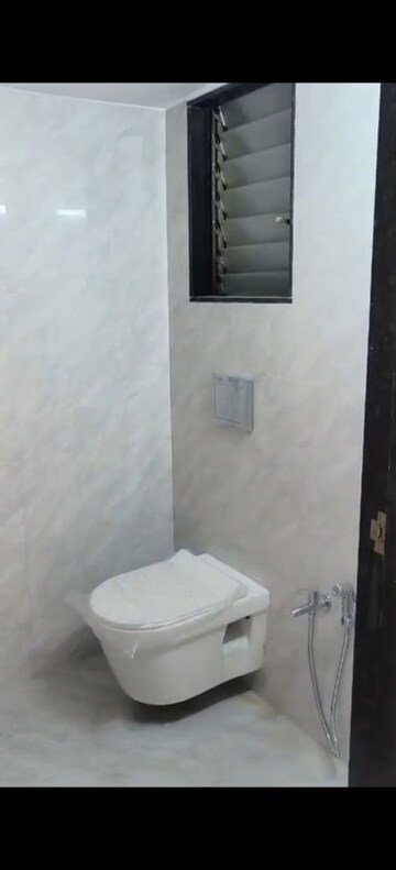 Bathroom in 1 BHK Apartment at Happy Home Sarvoday Marvel, Kalyan West – for Sale