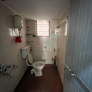 Bathroom in 2 BHK Apartment at Shiv Hara CHS, Asara Colony – for Rent