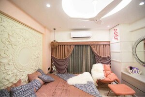 Living Room in 5 BHK Apartment at Paradigm Nivan, Khar West – for Rent