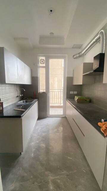 Kitchen in 3 BHK Apartment at Ace Starlit, Sector 152 – for Rent