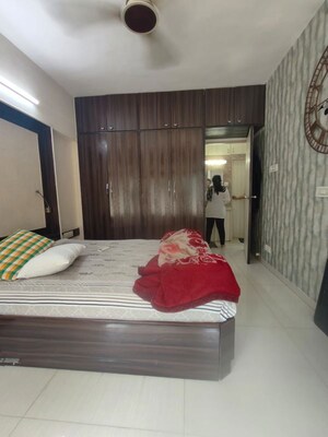 Bedroom in 1 BHK Apartment at Royal Pleasant Park CHS, Malad West – for Rent