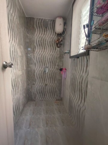 Bathroom in 1 BHK Apartment at Royal Pleasant Park CHS, Malad West – for Rent