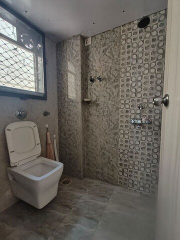 Bathroom in 1 BHK Apartment at Royal Pleasant Park CHS, Malad West – for Rent