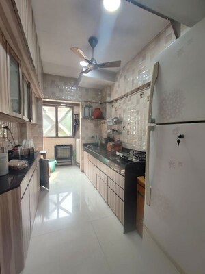 Kitchen in 1 BHK Apartment at Royal Pleasant Park CHS, Malad West – for Rent