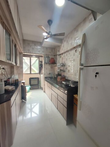 Kitchen in 1 BHK Apartment at Royal Pleasant Park CHS, Malad West – for Rent