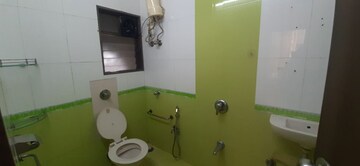 Bathroom in 3 BHK Apartment at Shree Balaji Satyam Towers, Kopar Khairane – for Rent