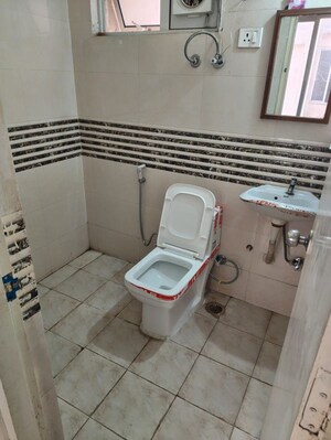 Bathroom in 1.5 BHK Apartment at Shree Vardhman Green Court, Sector 90 – for Rent