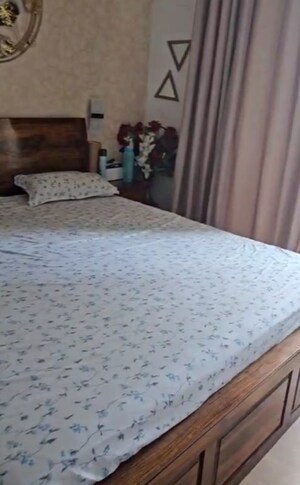 Bedroom in 3 BHK Apartment at Emaar Palm Gardens, Sector 83 – for Rent