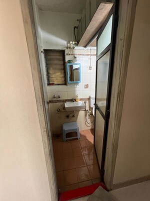 Bathroom in 2 BHK Apartment at Cosmos Habitat, Majiwada – for Rent