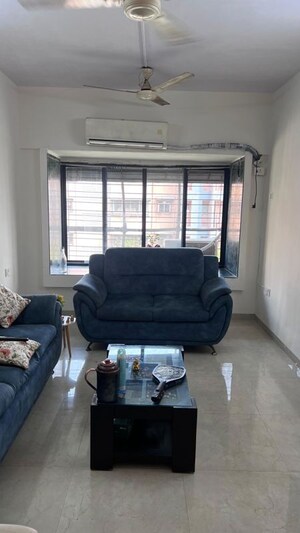 Living Room in 2 BHK Apartment at HDIL Metropolis Residences, Andheri West – for Rent