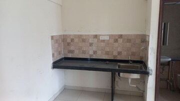 Kitchen in Studio Apartment at Puravankara Silversands, Mundhwa – for Rent