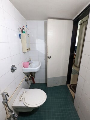 Bathroom in 2 BHK Apartment at Rajaram Sukur Sapphire, Ghodbunder Road – for Rent
