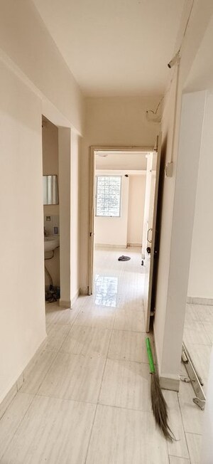 Building Lobby in 1 BHK Apartment at Wadgaon Sheri – for Rent
