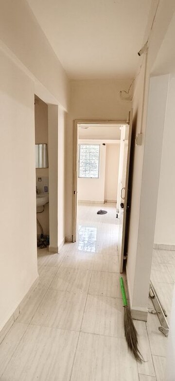 Building Lobby in 1 BHK Apartment at Wadgaon Sheri – for Rent