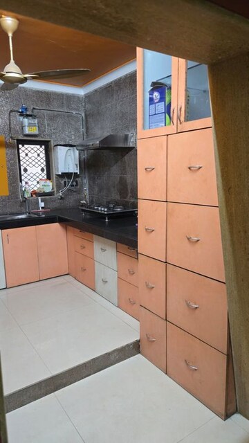 Kitchen in 4 BHK Apartment at Dreamland CHS Sanpada, Sanpada – for Rent