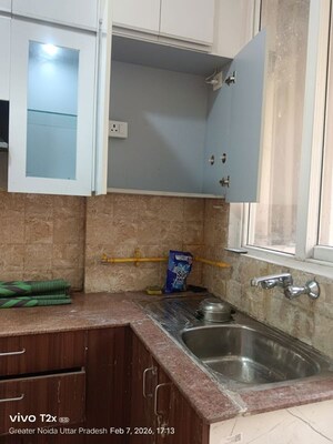 Kitchen in 2 BHK Apartment at Amrapali Golf Homes, Sector 4 Greater Noida – for Rent
