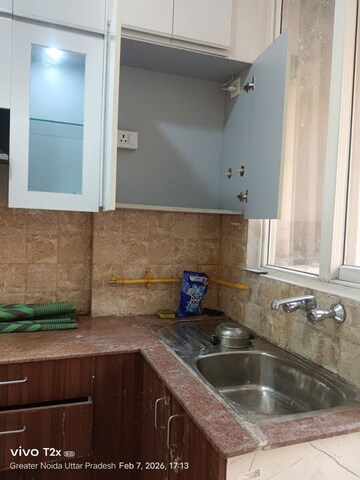 Kitchen in 2 BHK Apartment at Amrapali Golf Homes, Sector 4 Greater Noida – for Rent