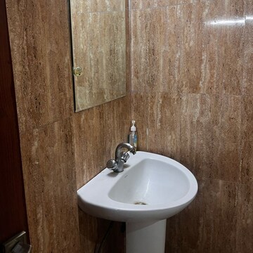 Bathroom in 1 RK Apartment at Urbtech Xaviers, Sector 168 – for Rent