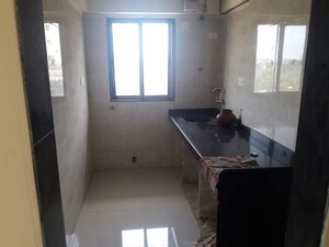 Kitchen in 2 BHK Apartment at Ameet Tower, Chembur – for Sale