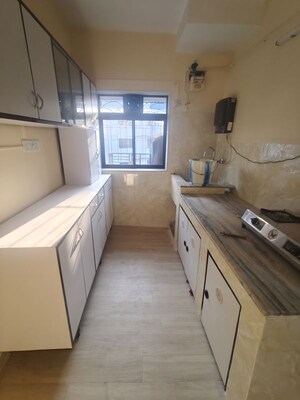 Kitchen in 2 BHK Apartment at Laxmi Apartment Andheri, Andheri East – for Rent