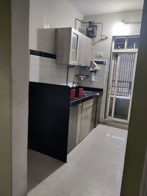 Kitchen in 2 BHK Apartment at Sadguru Garden CHS, Ghodbunder Road – for Rent