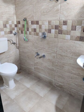 Bathroom in 2 BHK Apartment at Sadguru Garden CHS, Ghodbunder Road – for Rent