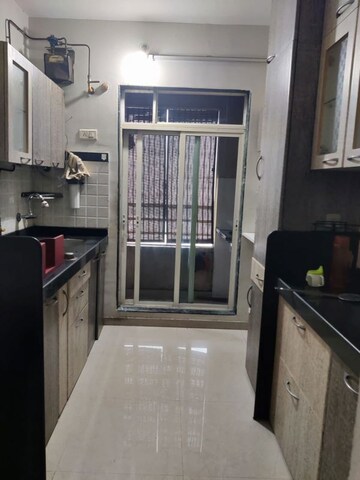 Kitchen in 2 BHK Apartment at Sadguru Garden CHS, Ghodbunder Road – for Rent