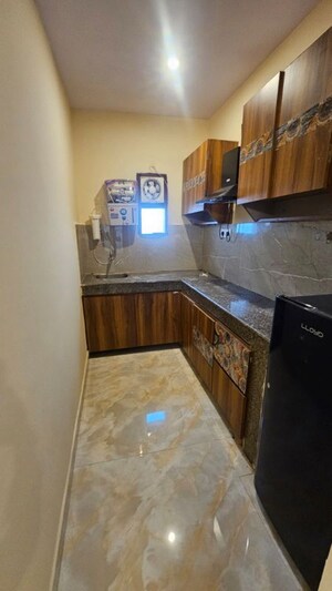 Kitchen in 1 RK Builder Floor at DLF City Phase III, Sector 24 – for Rent