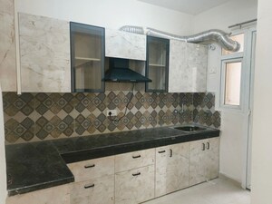 Kitchen in 2 BHK Apartment at Signature The Millennia 3, Sector 37d – for Rent