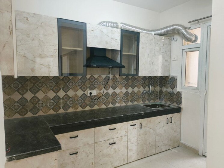 Kitchen, signature-the-millennia-3 2 Bedroom 600 Sq.Ft. Apartment In Sector 37d Gurgaon 9923258