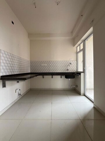 Kitchen in 2 BHK Apartment at Godrej Green Vistas, Mahalunge – for Rent
