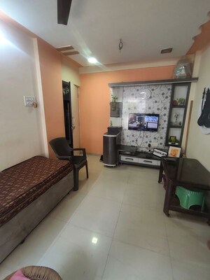 Living Room in 1 BHK Apartment at Raunak Unnathi Greens, Kasarvadavali – for Sale