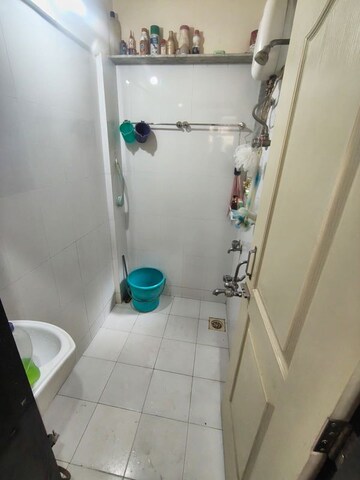 Bathroom in 1 BHK Apartment at Raunak Unnathi Greens, Kasarvadavali – for Sale