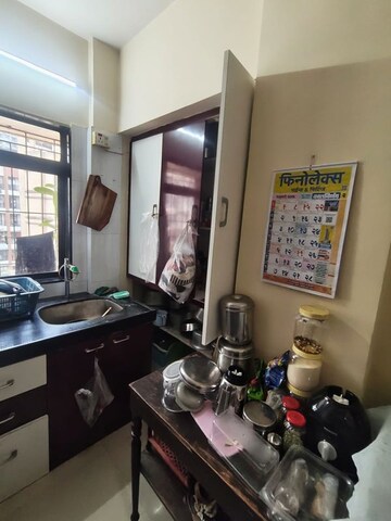 Kitchen in 1 BHK Apartment at Raunak Unnathi Greens, Kasarvadavali – for Sale