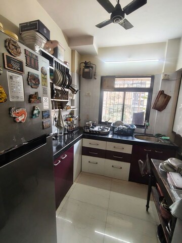 Kitchen in 1 BHK Apartment at Raunak Unnathi Greens, Kasarvadavali – for Sale