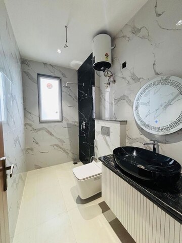 Bathroom in 4 BHK Builder Floor at Ansal API Esencia, Sector 67 – for Sale
