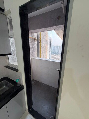 Kitchen in 2 BHK Apartment at Kolte Patil R10, Hinjewadi – for Rent