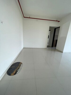 Building Lobby in 2 BHK Apartment at JP North Barcelona, Mira Road – for Rent