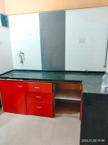 Kitchen in 2 BHK Apartment at Sangam Enclave, Sector 8 Airoli – for Rent