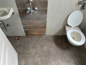 Bathroom in 2 BHK Apartment at Swastik Palms CHS, Brahmand – for Rent
