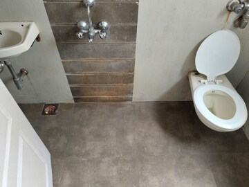 Bathroom in 2 BHK Apartment at Swastik Palms CHS, Brahmand – for Rent