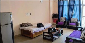Living Room in 2 BHK Apartment at Ansal API Olympus Lake View, Sushant Golf City – for Rent