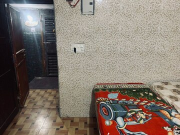 Bedroom in 2 BHK Apartment at Tilak Nagar – for Rent