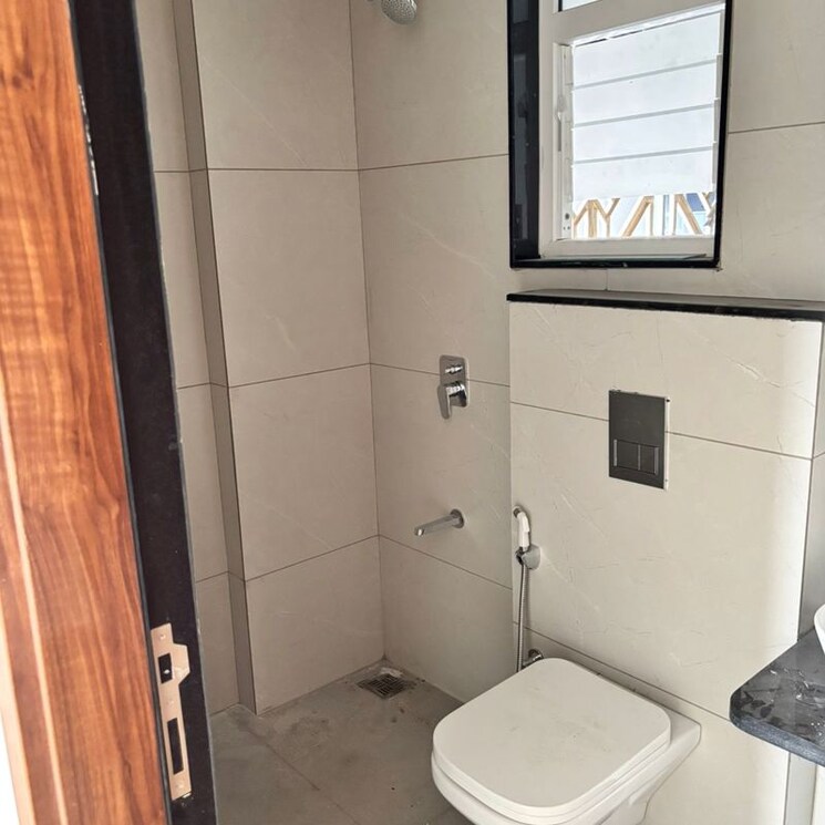 Bathroom, pristine-allure 2 Bedroom 782 Sq.Ft. Apartment In Santipur Pune 9923567