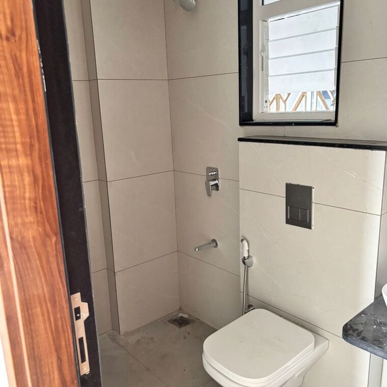 Bathroom, pristine-allure 2 Bedroom 782 Sq.Ft. Apartment In Santipur Pune 9923567