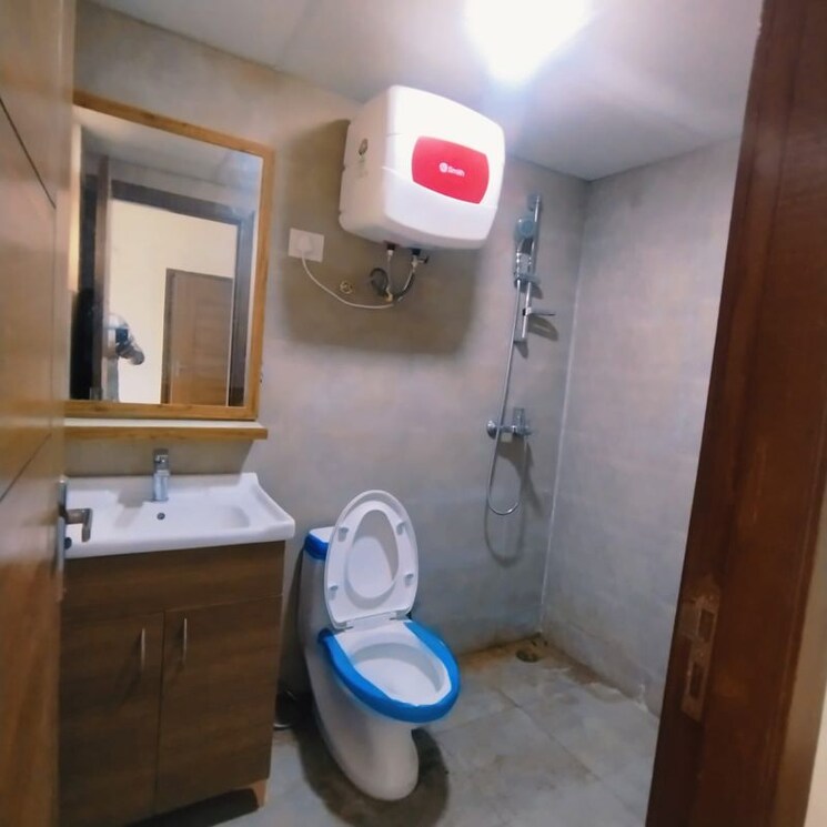 Bathroom, tulip-yellow 3 Bedroom 1704 Sq.Ft. Apartment In Sector 69 Gurgaon 9904183