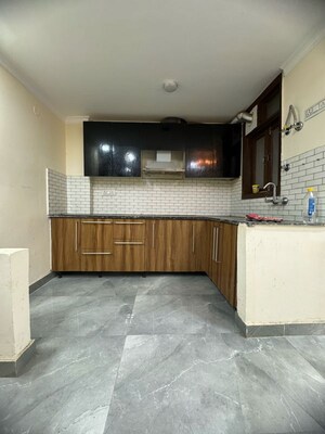 Kitchen in 2 BHK Builder Floor at Palm Residency Chhatarpur, Rajpur Khurd Extension – for Rent