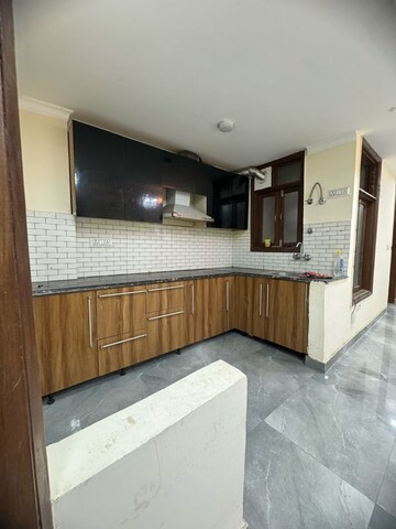 Kitchen in 2 BHK Builder Floor at Palm Residency Chhatarpur, Rajpur Khurd Extension – for Rent