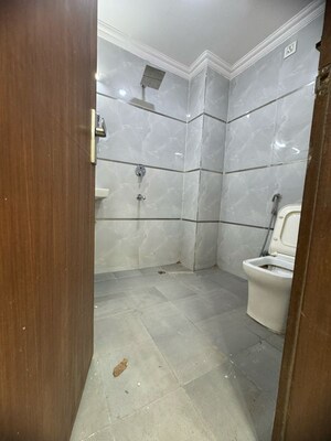 Bathroom in 2 BHK Builder Floor at Palm Residency Chhatarpur, Rajpur Khurd Extension – for Rent